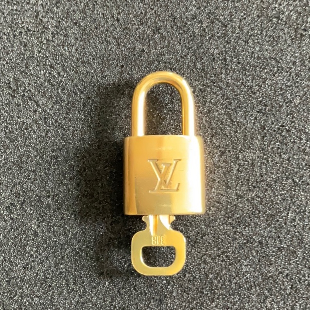 Louis Vuitton authentic padlock and key #318